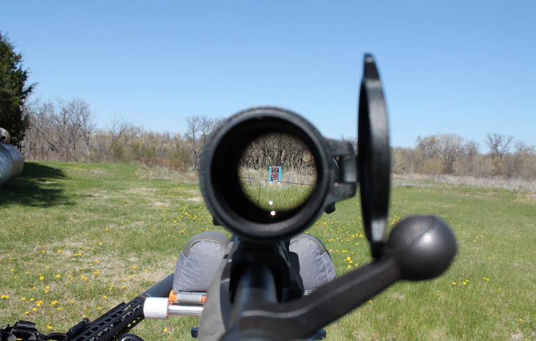 looking through a rifle scope